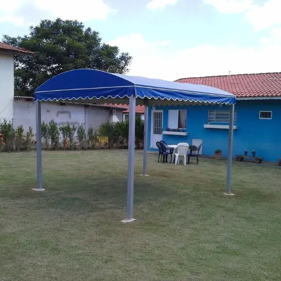 Reforma de Toldos e Coberturas em Americana SP — Cobertura em quintal residencial coberto