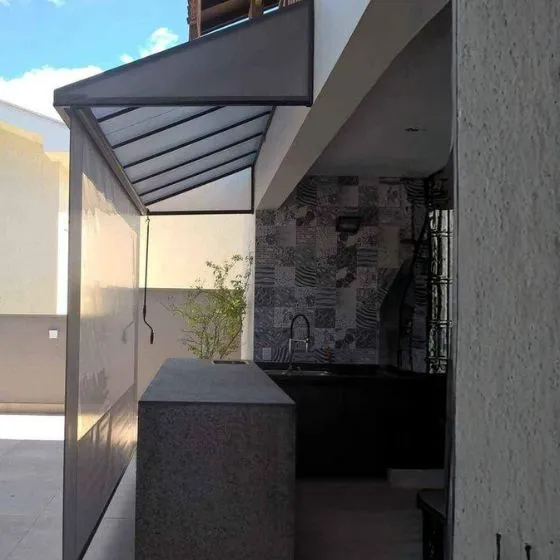 Reforma de Toldos e Coberturas em Americana SP — Instalação em fachada comercial